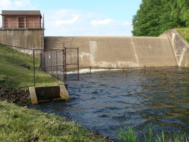 Water flowing over the repaired Mackenzie Reservoir spillway
